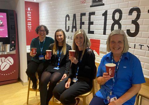 Staff at Acre Mill enjoying the new vending area