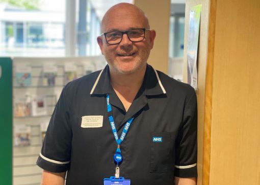 Ian Noonan stood in the main entrance of Huddersfield Royal Infirmary