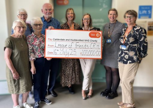 Some of the League of Friends team with our Charity Team and Maternity team - holding a huge cheque for £100,000