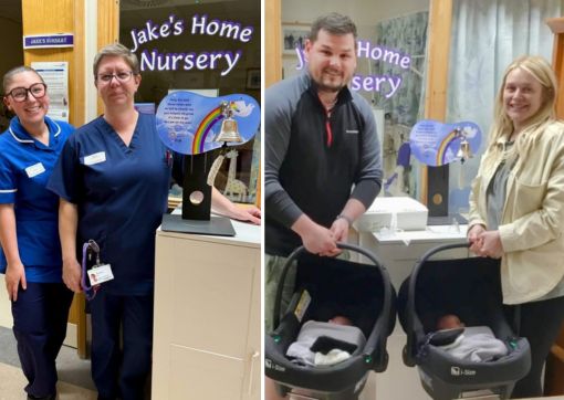 A family stood next to the new neonatal bell