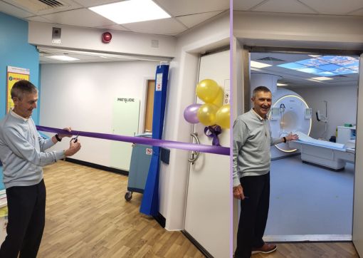 John cutting the ribbon