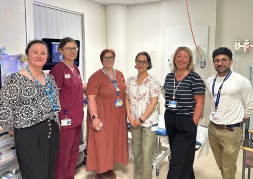 A group photo of the teams involved in the project