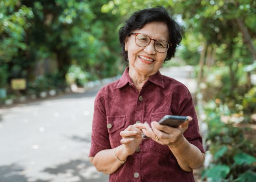 An older lady using a mobile phone