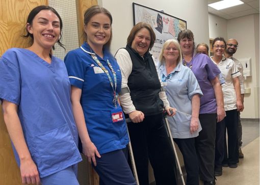 Pauline pictured smiling with some of the team who helped care for her