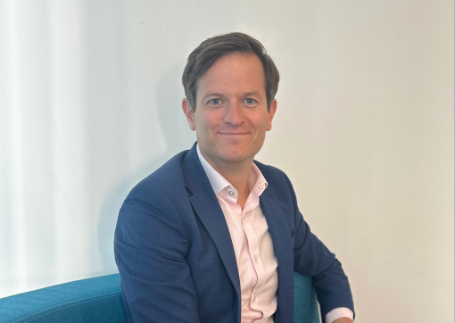 A headshot photo of Rob Aitchison