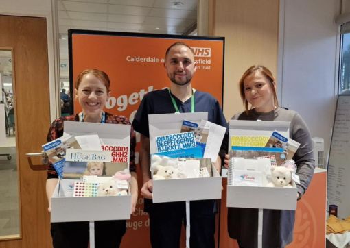 Liz Martel, Anthony Thomas and Becky Fletcher with some of the boxes