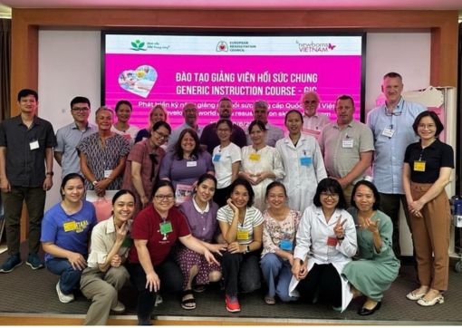 Helen pictured third from left middle row, with one of the groups of future instructors
