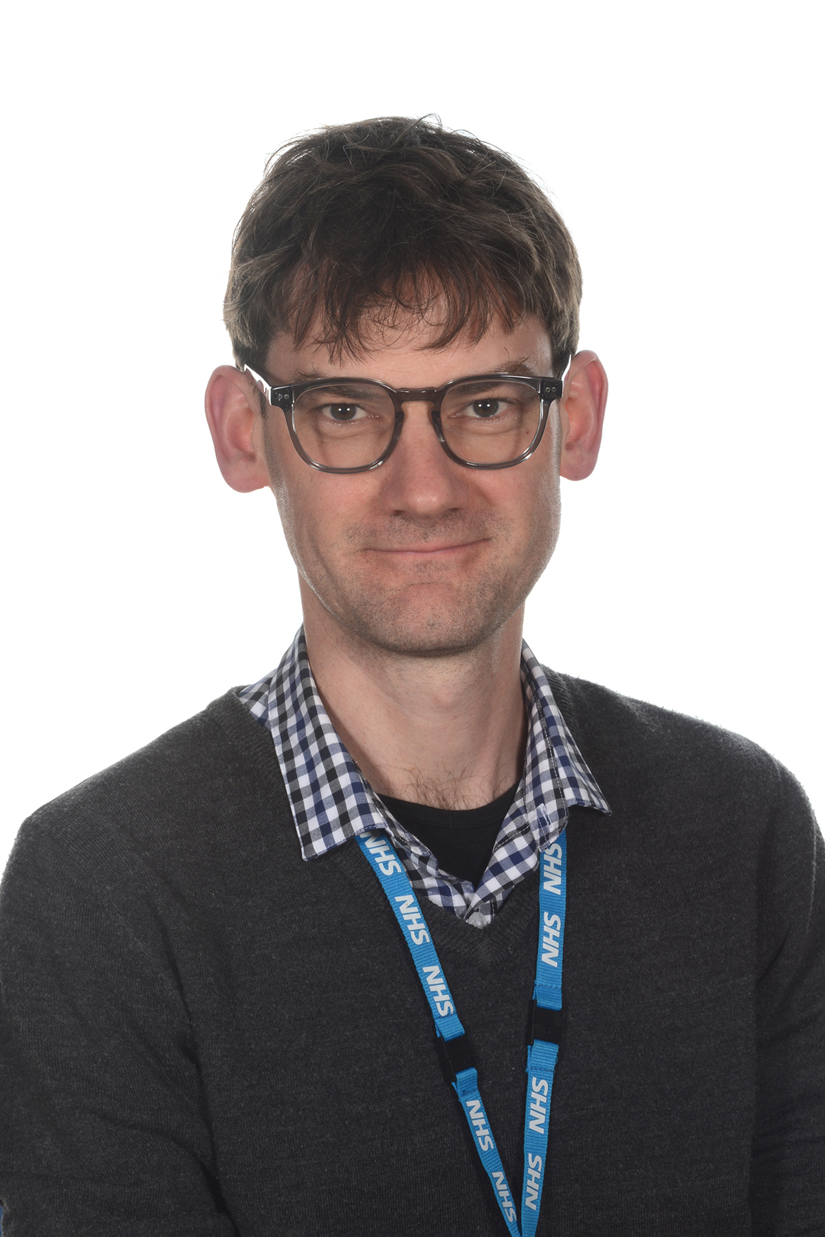 A person wearing glasses and a black top