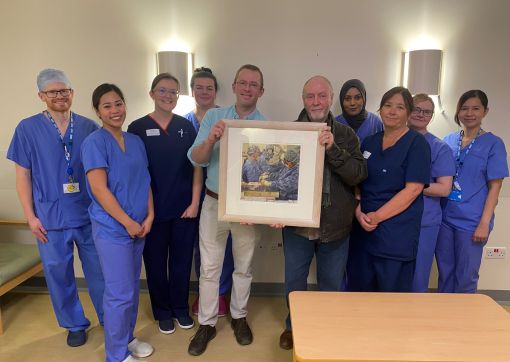 Some of the theatres team with Graham and artist Alan Flood