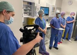 A man videoing some of our staff for our We are #TeamCHFT video