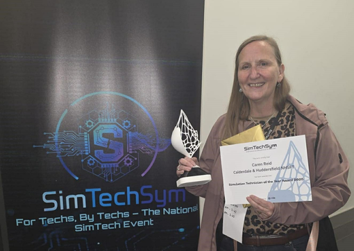 Caren with her certificate and trophy after the event
