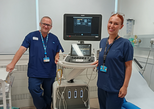 Trainee Cardiac Physiologist, Ciara Wood, right with her colleague Wayne Massey in a clinical room