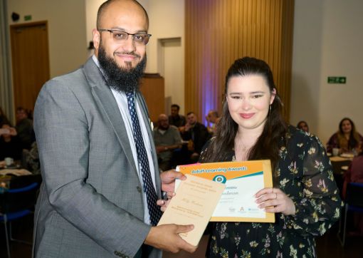 Holly with her Award