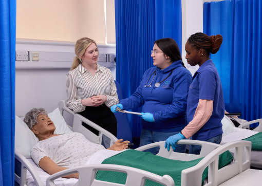 Two students from Kirklees College in our simulation suite with a tutor