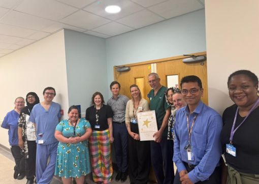 Dr Morris (centre) and the paediatric team