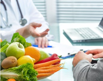 A doctor talking to a patient