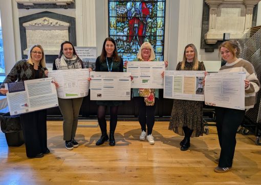 Jessica, Emily, Michelle, Anita, Claire and Emma with their improvement work