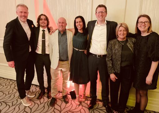 Mark Davies (pictured third from left) and Janette Cockroft (pictured second from right) with colleagues from Laing O'Rourke at the Digital Construction Awards 2026