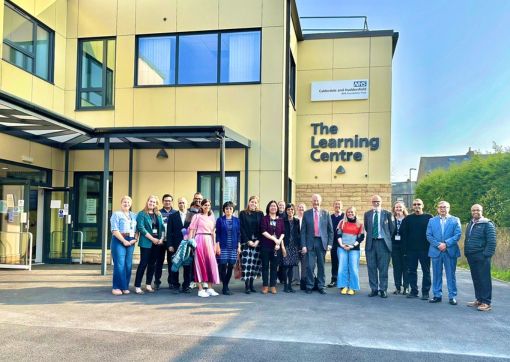 A photo of the Learning Centre team, with clinical colleagues and exam participants outside the centre after day two
