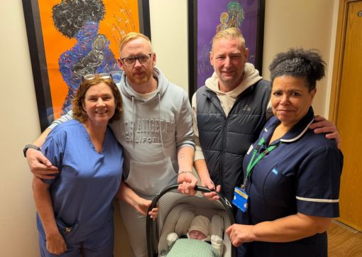 Pictured left to right are Midwife Paula Dickinson, James and Jason Lambert-Sykes holding son Myles and Midwife Carol Sarr