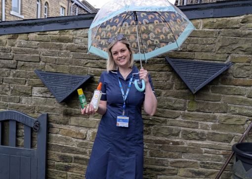 Rachel Jackson, with her umbrella, mosquito repellent and sun cream