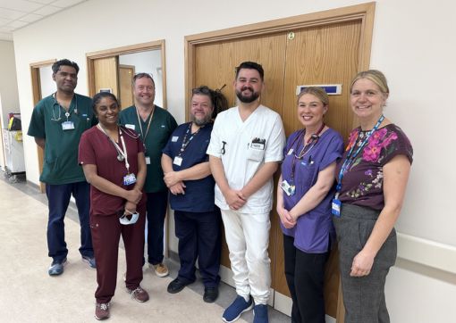 Sinan (middle in white) with a few of our members of staff