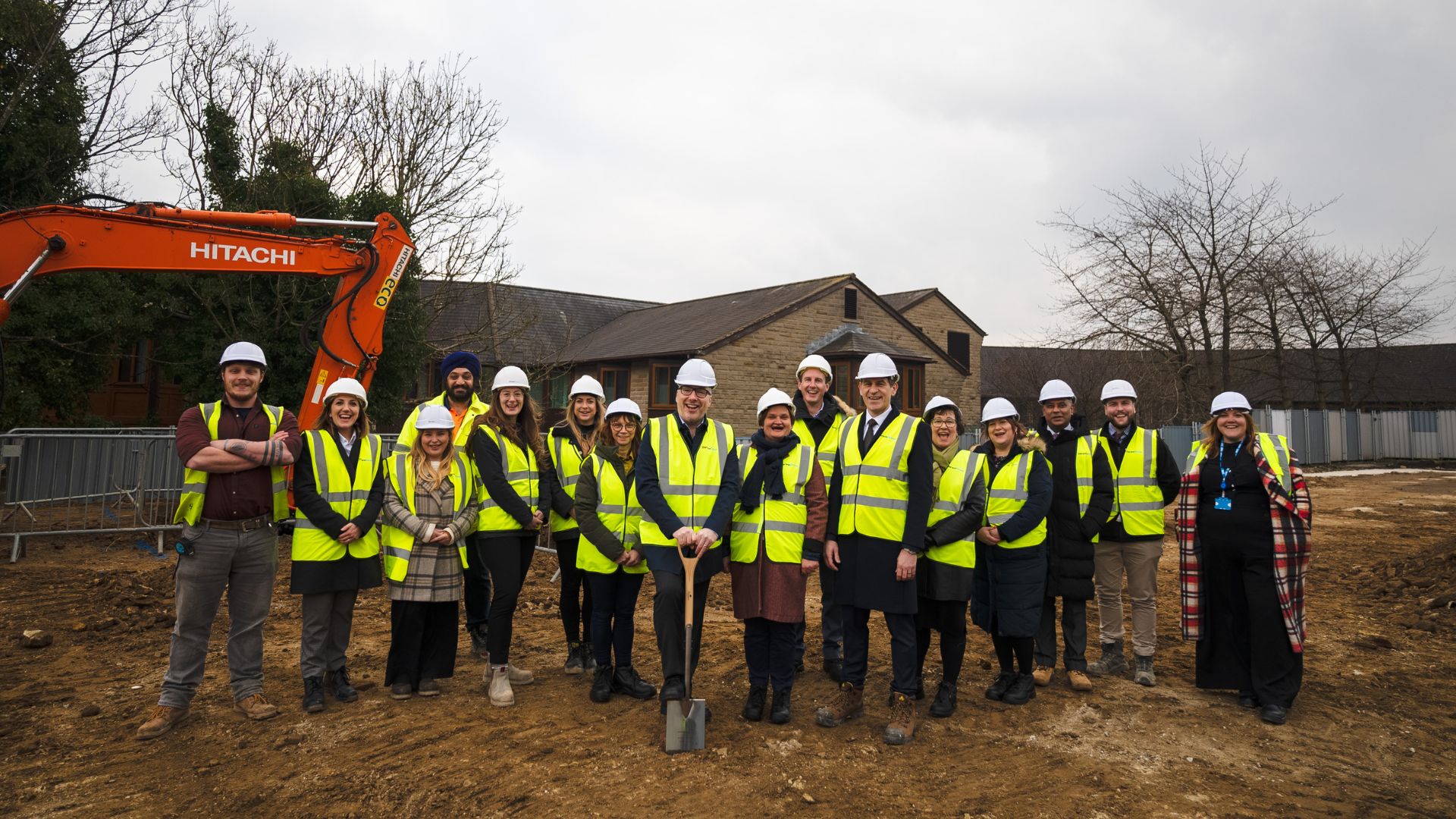 CHFT Chief Executive, Brendan Brown (centre), put the ceremonial spade in the ground. He is pictured with colleagues from CHFT and partners at Darwin Group